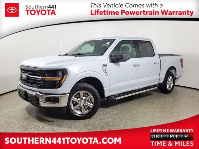 2025 Ford F-150 XLT in Agate Black Metallic — front three-quarter view