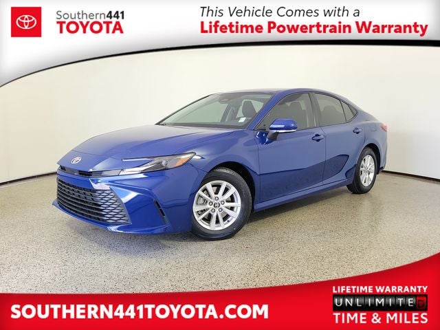 2026 Toyota Camry LE in Reservoir Blue — front three-quarter view