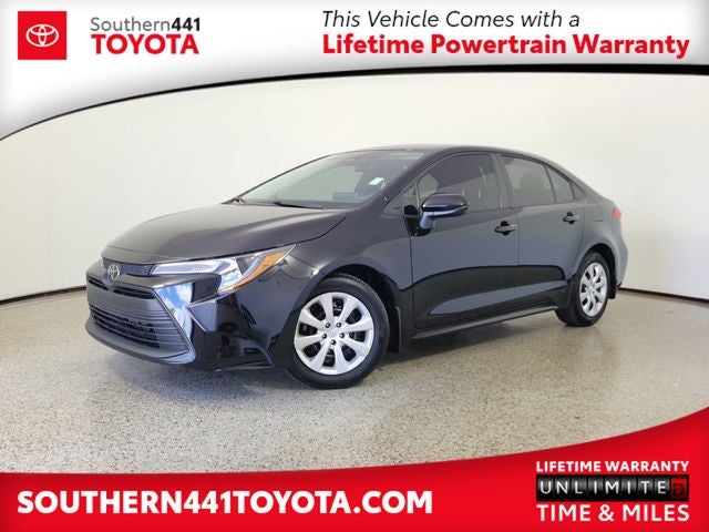 2025 Toyota Corolla LE in Midnight Black Metallic — front three-quarter view