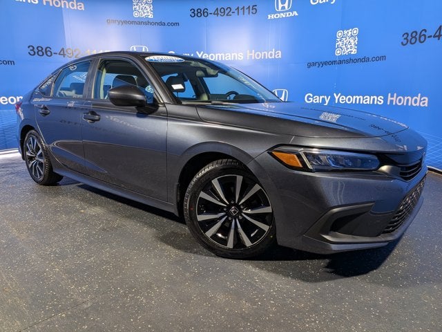 2024 Honda Civic EX in Meteorite Gray Metallic — front three-quarter view