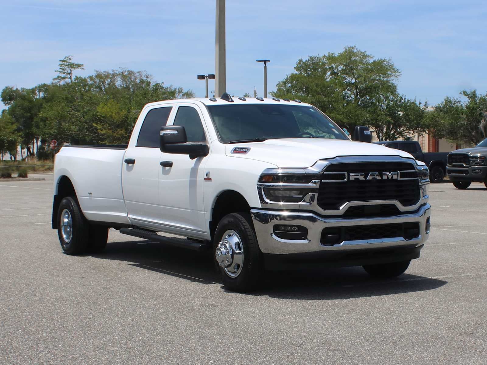 2026 RAM 3500 Tradesman in Bright White Clearcoat — front three-quarter view