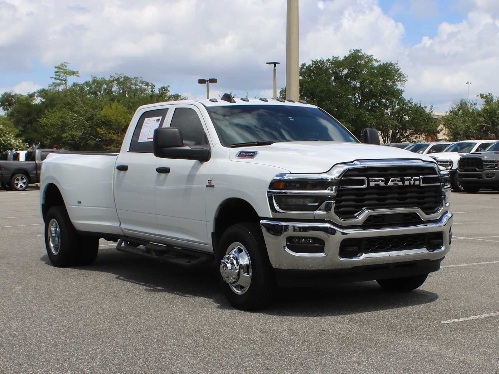 2026 RAM 3500 Tradesman in Bright White Clearcoat — front three-quarter view