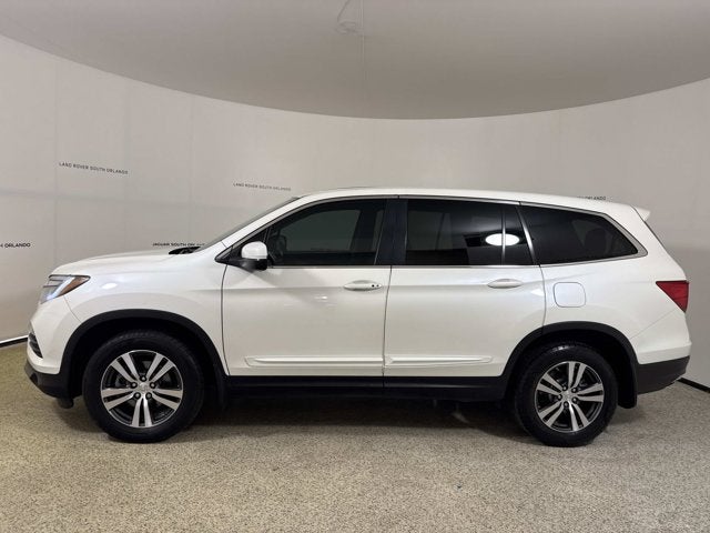 2017 Honda Pilot EX-L in White — front three-quarter view