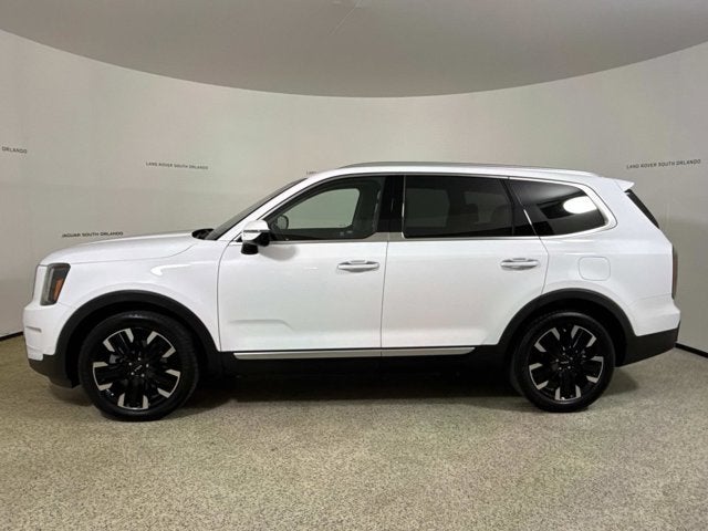 2023 Kia Telluride SX in Glacial White Pearl — front three-quarter view