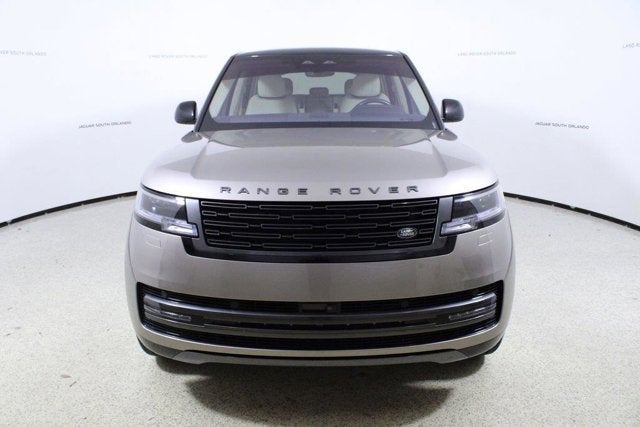 2023 Land Rover Range Rover SE in Batumi Gold Premium Metallic — front three-quarter view