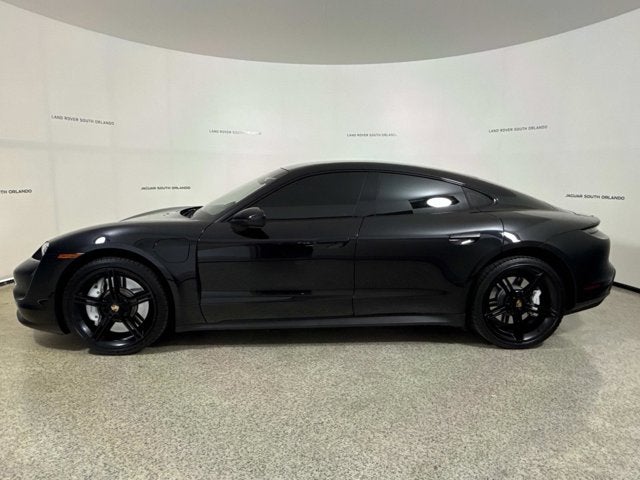 2022 Porsche Taycan 4S in Jet Black Metallic — front three-quarter view