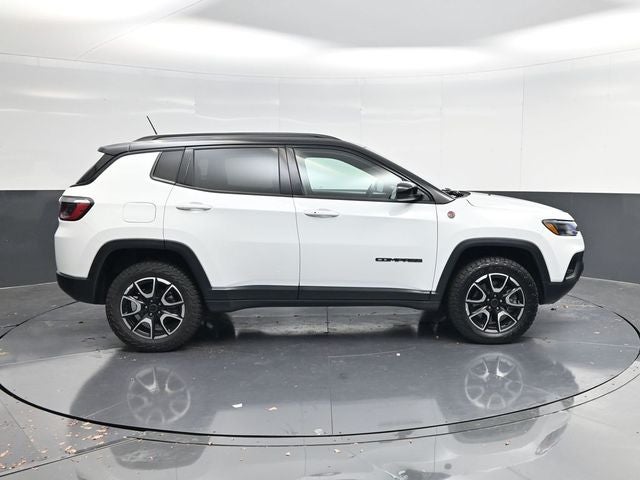 2025 Jeep Compass Trailhawk in Bright White Clearcoat — front three-quarter view