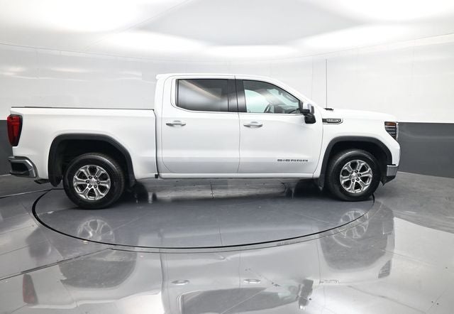 2024 GMC Sierra 1500 SLT in Summit White — front three-quarter view