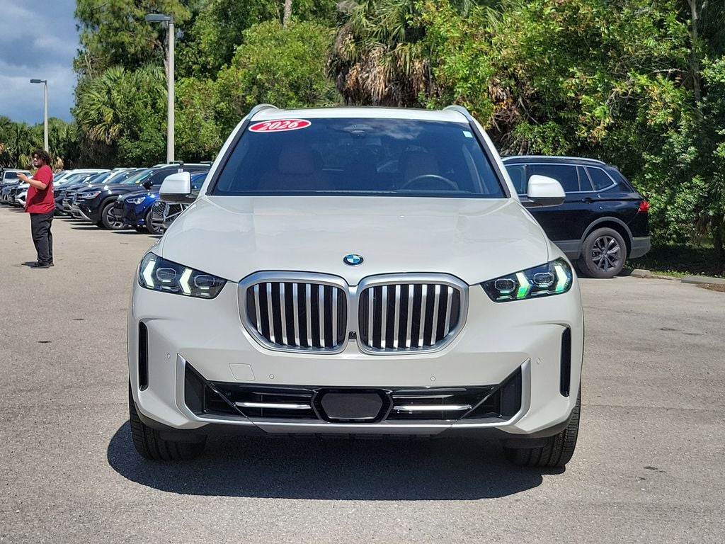 2026 BMW X5 sDrive40i in Mineral White Metallic — front three-quarter view