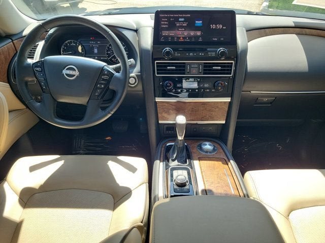 2023 Nissan Armada SL in Hermosa Blue Pearl — front three-quarter view