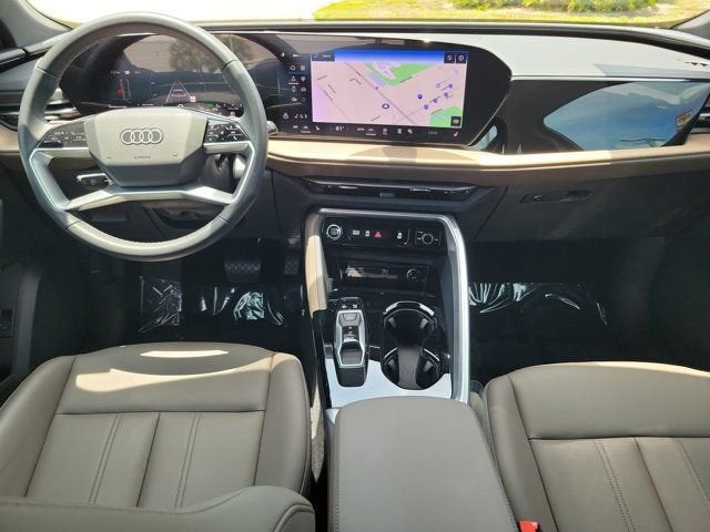 2025 Audi Q5 2.0T Premium in Navarra Blue Metallic — front three-quarter view