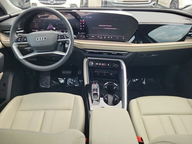 2025 Audi Q5 2.0T Premium in Navarra Blue Metallic — front three-quarter view