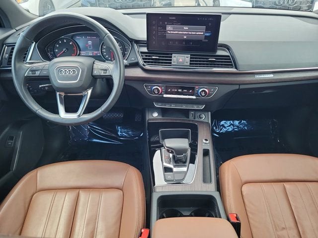 2021 Audi Q5 45 Premium in Manhattan Gray Metallic — front three-quarter view