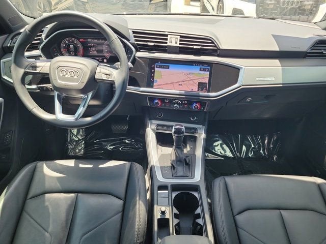 2023 Audi Q3 Premium Plus in Mythos Black Metallic — front three-quarter view