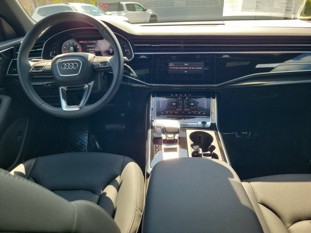 2026 Audi Q8 55 Premium Plus in Waitomo Blue Metallic — front three-quarter view