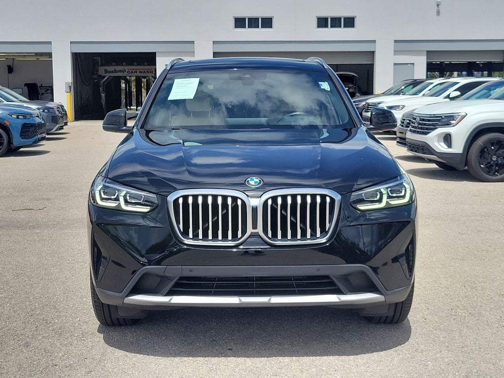 2022 BMW X3 sDrive30i in Jet Black — front three-quarter view